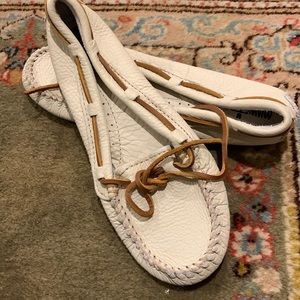 Minnetonka pebble leather ivory moccasins.Rubber bottom,  size 7 1/2
